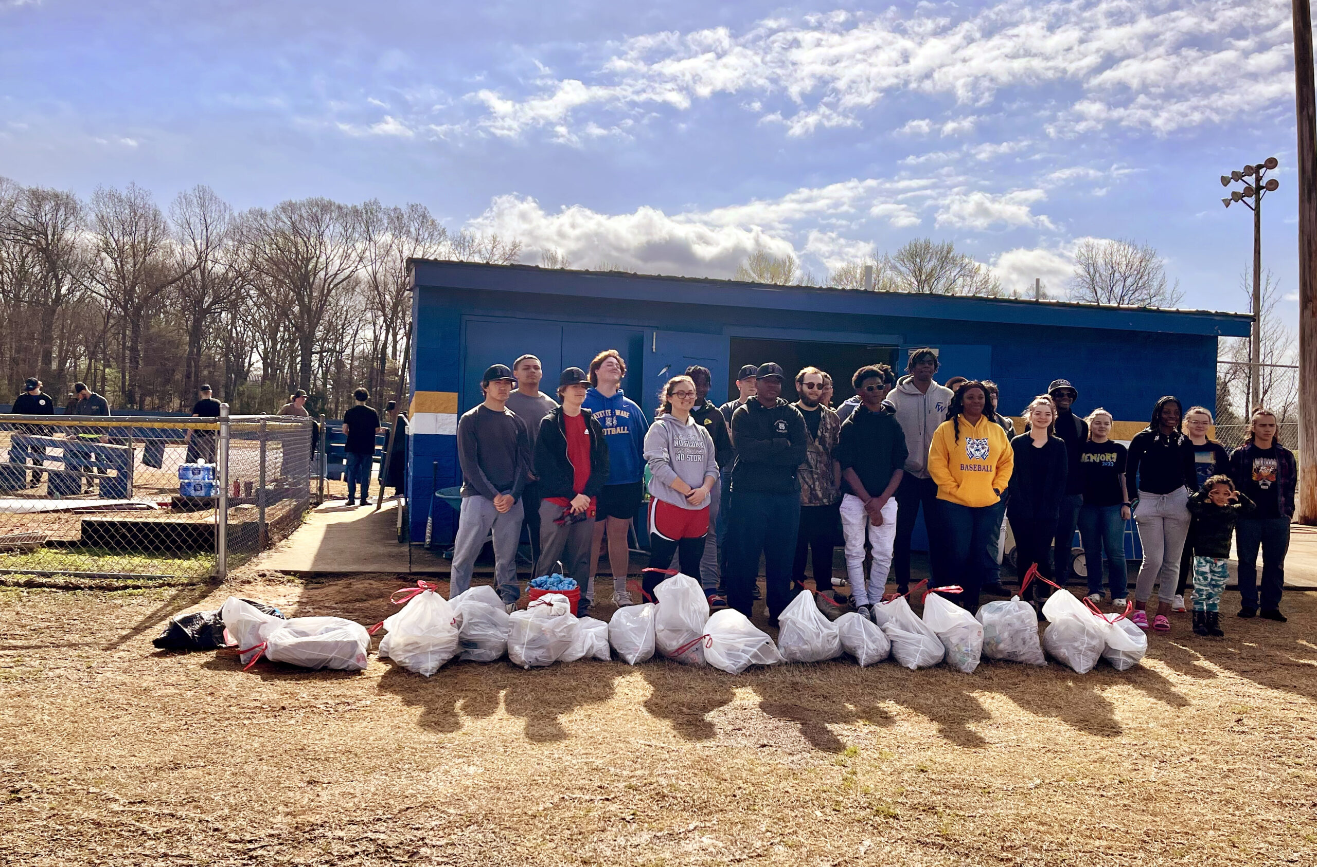 Community First as Wildcats Clean School Grounds